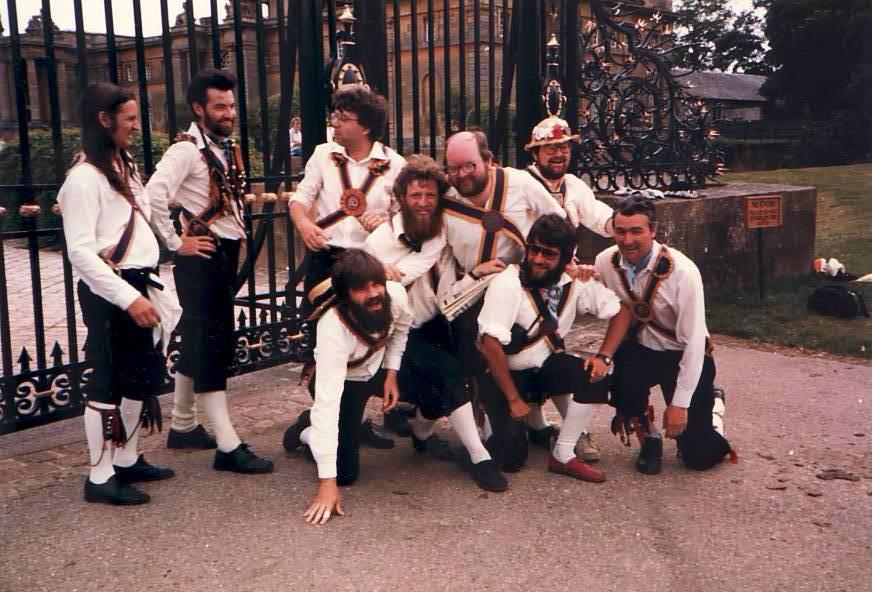 Brighton morris dancers c1987 standing outside iron gates