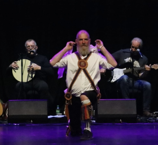 Brighton Morris dancer completes the finale of the dance Southover at Brighton Dome in support of Shirley Collins. May 21st. Photo copyright Ian Marchant
