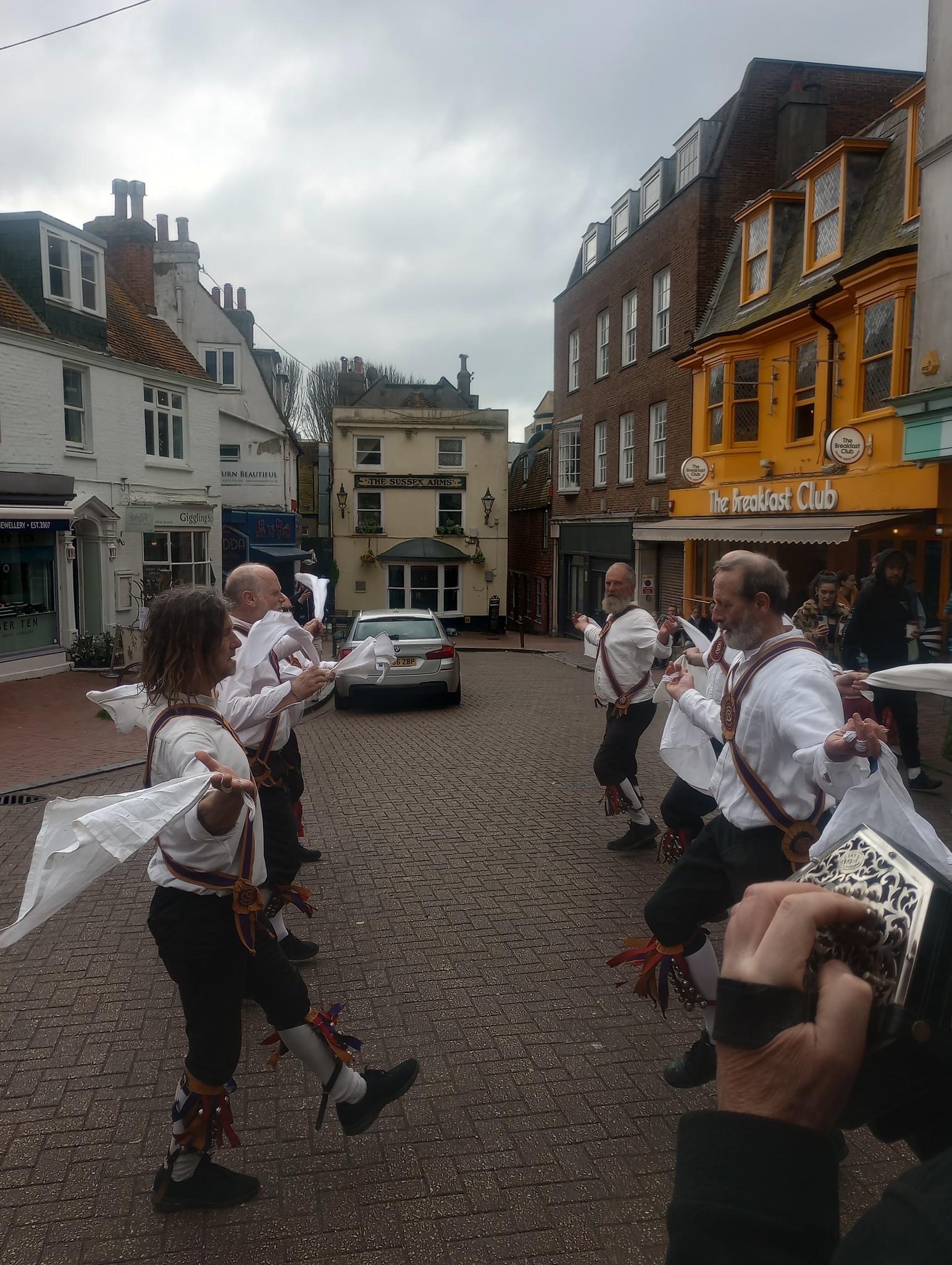 Brighton Morris perform a hanky dance outside The Pump House, Brighton on May Day.